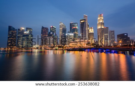 SINGAPORE-FEBRUARY 16: The Singapore skyline in twilight time on February 16,2015. Singapore is the 14th largest exporter and the 15th largest importer in the world