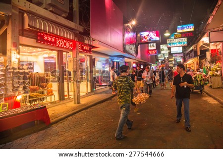 PATTAYA - APRIL 30: Crowd walking through the Walking Street on April 30, 2015 in Pattaya, Thailand. Its a tourist attraction primarily for night life and entertainment