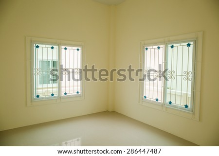 New yellow room with glass windows