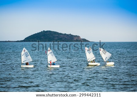 CHONBURI, THAILAND - JULY 24 : The group of student are training sailing in the sea at Sattahip bay in Chonburi province,Thailand on July 24,2015.