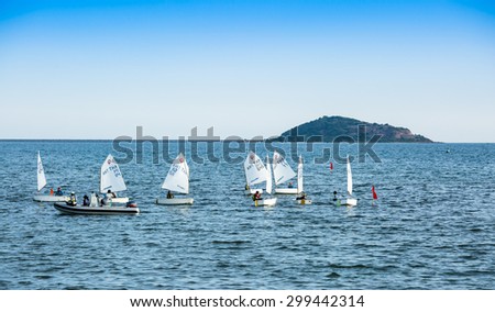 CHONBURI,THAILAND - JULY 24 : The group of student are training sailing in the sea at Sattahip bay in Chonburi province,Thailand on July 24,2015.