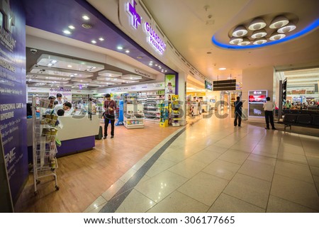 DELHI, INDIA - AUGUST 12: The duty free shops and passengers are in International Airport of Delhi on August 12, 2015. Indira Gandhi International Airport is the 32th busiest in the world.