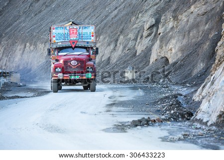 LEH LADAKH , INDIA - AUGUST 11 : The big colorful truck on Indian Himalayas high altitude road in Leh Ladakh,India on August 11, 2015.