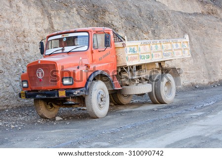LEH LADAKH , INDIA - AUGUST 11 : The big colorful truck on Indian Himalayas high altitude road in Leh Ladakh,India on August 11, 2015.