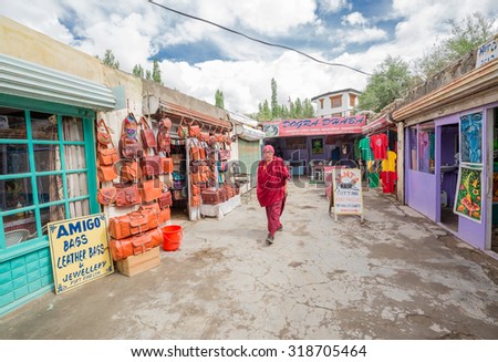 LEH LADAKH , INDIA - AUGUST 11 : The shopping area and traffic road in city in summer time in Leh Ladakh,India on August 11, 2015.