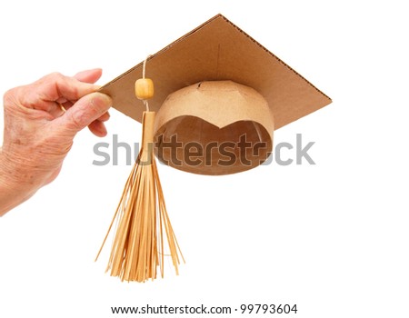 Holding graduating hat concept