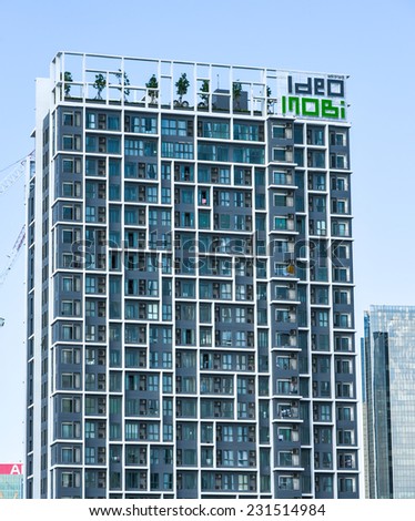 Bangkok, Thailand - November 11, 2014 - New condominium under blue sky along sky train lines in Bangkok.