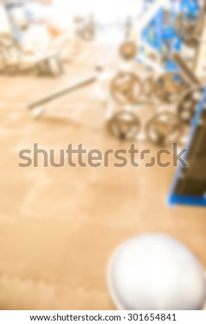 blurred image of gym for background - healthy fitness club clean center