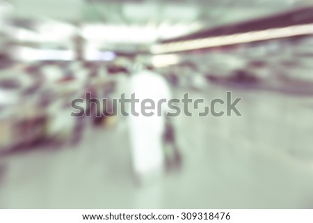 blurred background : business passenger in motion at airport terminal -  blur background concept