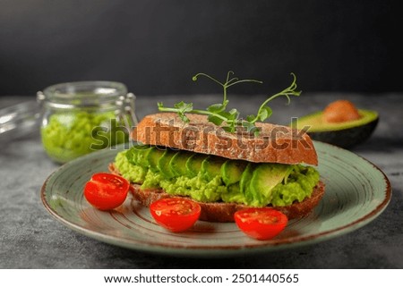 Similar – Image, Stock Photo Vegan sandwich with avocado in male hands