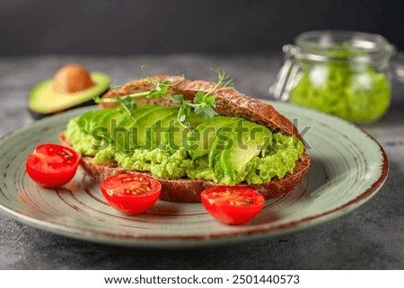 Similar – Image, Stock Photo Vegan sandwich with avocado in male hands