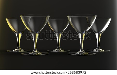 Martini glasses with gold on plain background