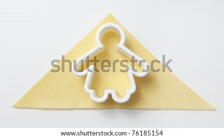 Man in a house, home concept, made up with pasta and pastry cutter.