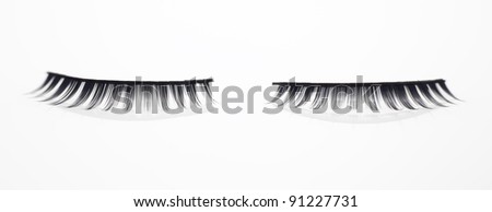 Set of fake eyelashes in white background.