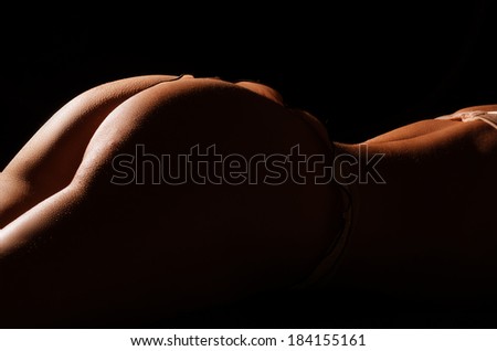 Parts of the body of young caucasian woman on black  background