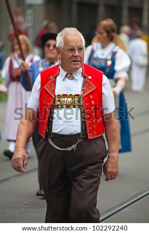 ZURICH - AUGUST 1: Swiss National Day parade on August 1, 2009 in Zurich, Switzerland. Representative of canton Appenzeller in a historical costume.