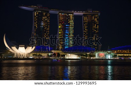 SINGAPORE - FEBRUARY 22: The Marina Bay Sands complex on February 22, 2013 in Singapore. Marina Bay Sands is an integrated resort and billed as the world\'s most expensive standalone casino property.