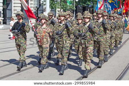 ZURICH - AUGUST 1: Infantry divisionof the Swiss army taking part in the Swiss National Day parade on August 1, 2012 in Zurich, Switzerland.