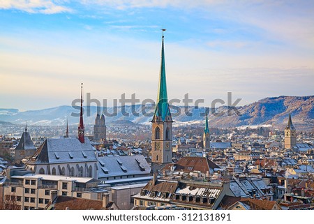 City center and famous Zurich churches covered by fresh snow