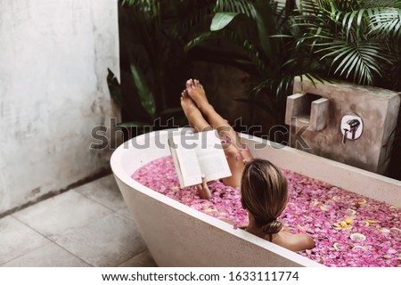 Similar – Image, Stock Photo flower petal on female breast VIII