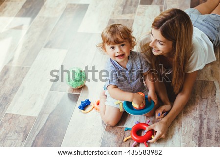 Similar – Image, Stock Photo Mother playing with toddler