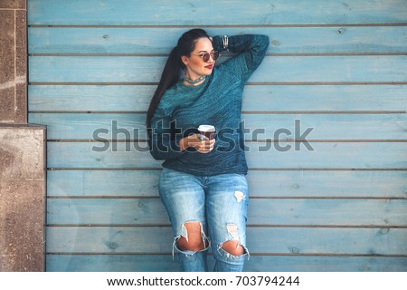 Similar – Image, Stock Photo Young Woman in Jeans and Jacket Listening to Earphones on Sidewalk