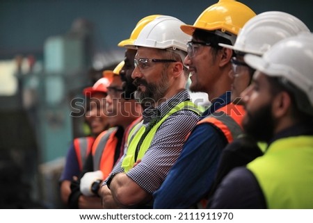 engineer team  full skill quality for maintenance and training  in industry factory worker , warehouse Workshop for factory operators, mechanical engineering team production. Stockfoto © 