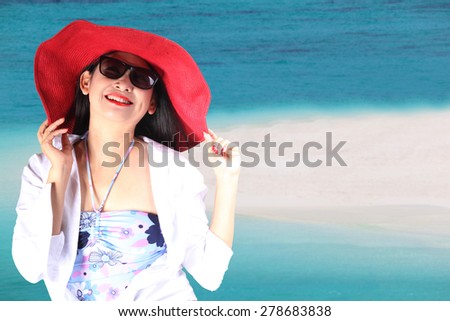 woman on sea beach blue sky sand sun daylight relaxation landscape viewpoint for design postcard and calendar in thailand