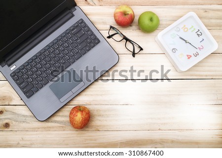 overhead of office table or student table with notebook, computer keyboard copy space