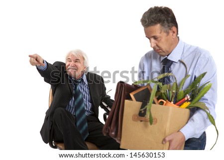 chief kicks out the dismissed worker with a box of his things, focus on boss
