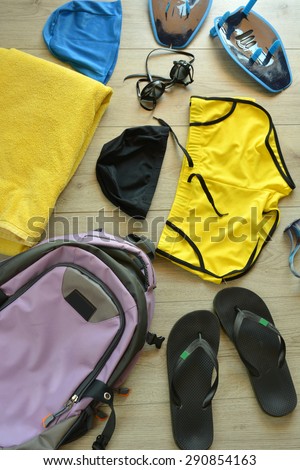 accessories for swimming pool (swimming goggles, hat, bathing suit, bag, etc)