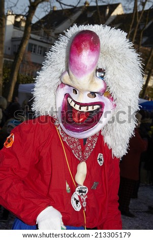 BASEL, SWITZERLAND - FEBRUARY, 18. The Carnival at Basel (Basle - Switzerland) in the year 2013. The picture shows some costumed people on February 18, 2013.