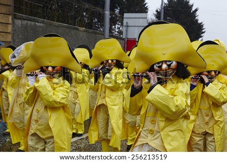 BASEL, SWITZERLAND - FEBRUARY, 23. The Carnival at Basel (Basle - Switzerland) in the year 2015. The picture shows some costumed people on February 23, 2015.