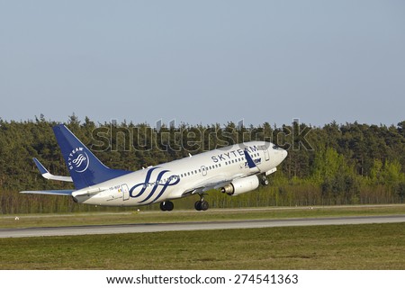 FRANKFURT, GERMANY - APRIL, 23. A Boeing 737-700 of Romanian Air Transport takes off at Frankfurt International Airport (Germany, FRA) on April 23, 2015.