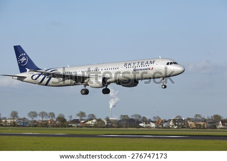 AMSTERDAM, THE NETHERLANDS - MAY, 7. An Airbus A321-211 of Air France (Skyteam Livery) lands at Amsterdam Airport Schiphol (The Netherlands, AMS) on May 7, 2015. The name of the runway is Polderbaan.