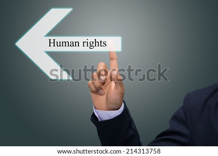 Business man hand pointing Human rights