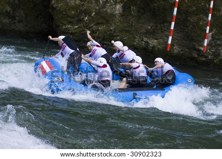 VRBAS, REPUBLIKA SRPSKA, BOSNIA - MAY 23: Team LATVIA in action on the 6th day night race slalom competition at World Rafting Champs Banja Luka 2009 May 23, 2009 in Vrbas.