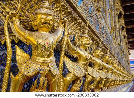 BANGKOK, THAILAND - NOVEMBER 12, 2014: Garuda statues in Wat Phra Kaew on November 12, 2014 in Bangkok, Thailand. Wat Phra Kaew is one of the most popular tourist attractions in Thailand.