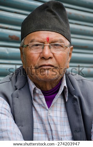 KATHMANDU, NEPAL - APRIL 23, 2015 : Portrait of unknown man on April 23, 2015 in Kathmandu, Nepal.