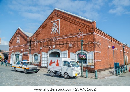 HAKODATE, JAPAN - JUNE 18, 2015 : The historical red-brick warehouses in bay area of Hakodate city on June 18, 2015. Hakodate city is the southernmost port city of Hokkaido Island, Japan.