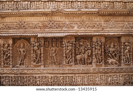 Ornate stone carved walls lining the 11th century Rani-ki-Vav step well at Patan, Gujarat, India. Awarded the status of a UNESCO world Heritage Site in 2014.
