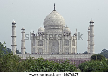 Taj Mahal. White marble tomb set on raised platform topped by large oval dome. Agra, Uttar Pradesh. India