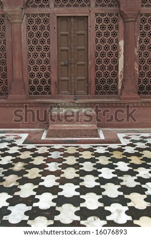 Taj Mahal. Detail of red sandstone doorway and patterned stone flooring. Agra, Uttar Pradesh. India