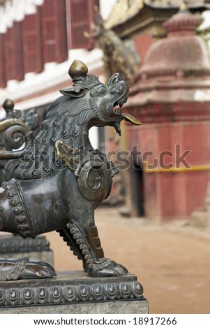 Bronze statue of a mythical creature guarding an ancient temple the Durbar Square at Bhaktapur, Nepal