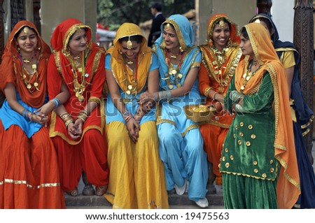 HARYANA, INDIA - FEBRUARY 15: Unknown group of colorfully dressed Indian ladies at a festival on February 15, 2007 at the Surajkund Mela, Haryana, India