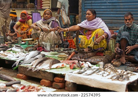 KOLKATA, INDIA - DECEMBER 18: Unknown people selling fish at a street market on December 18, 2008 in the Chowringhee area of Kolkata, West Bengal, India