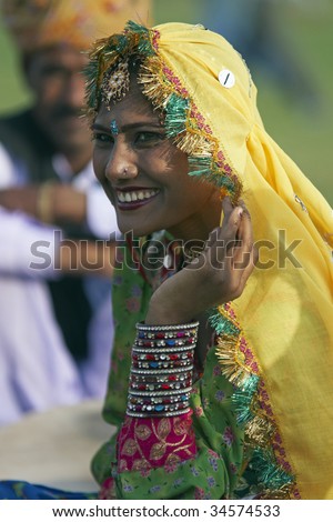 JAIPUR, INDIA - MARCH 10: Unidentified Indian woman laughing during a festival on March 10, 2009 in Jaipur, Rajasthan, India.