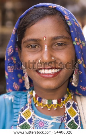 JAISALMER, INDIA - FEBRUARY 18: Unidentified Indian lady in traditional tribal outfit on February 18, 2008 in Jaisalmer Rajasthan, India.