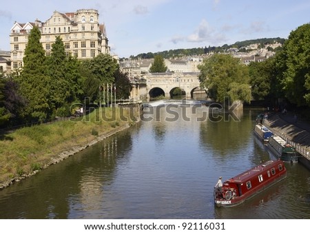 BATH, UNITED KINGDOM - AUGUST 28: Narrow boat in the River Avon on August 28, 2010 in BAth, Somerset, England.
