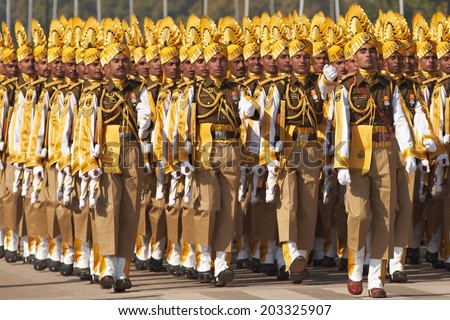 NEW DELHI, INDIA - JANUARY 23, 2008: Soldiers in bright yellow trimmed uniform parading down the Raj Path in preparation for the annual Republic Day Parade in New Delhi, India